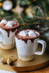 Cups of Hot Chocolate in a festive decoration, excellent illustration of warm drink for celebration and comfort 