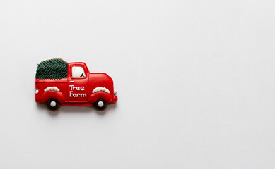 Red car of Christmas cookies on white background. A treat for Christmas. Place for your text.