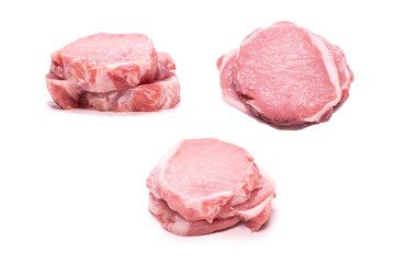 Raw pork pieces isolated on a white background.