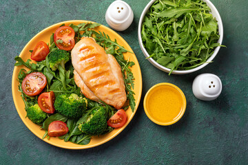Grilled chicken breast, chicken fillet and fresh vegetable salad. Healthy lunch menu. Healthy food, keto diet, dieting lunch concept