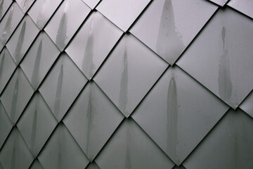 Metallic roof with drops of water.