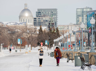 People walk in the Old Port in Montreal, Quebec, Canada.