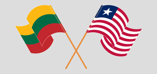 Crossed and waving flags of Lithuania and Liberia