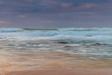 Rocks and waves - sunrise seascape at Bermagui