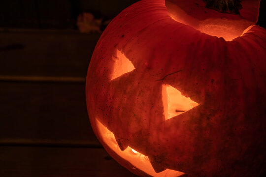 A close up of a jack-o-lantern pumpkin at halloween.
