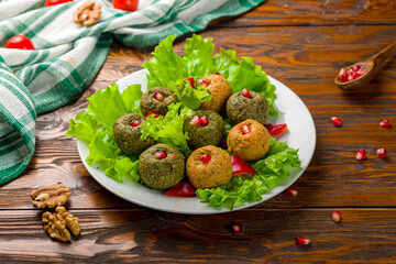 assorted pkhali Georgian cuisine on wooden table