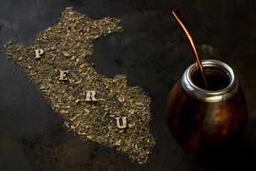 yerba mate in gourd matero with shape of Peru made by yerba mate