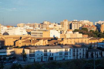 Obraz premium VALENCIA , SPAIN - DECEMBER 6, 2021: aerial cityscape view from Serranos towers on the old town of Valencia city in Spain