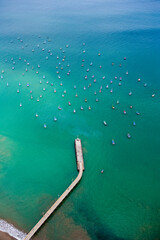 Fototapeta na wymiar Cabo Blanco Pier and Fishing Boats Peru