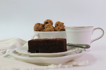 Chocolate cake with a cup of hot coffee