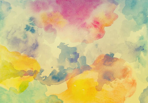 Watercolor background texture, colorful blue pink yellow purple and orange sunset or sunrise sky colors, pretty Easter backdrop