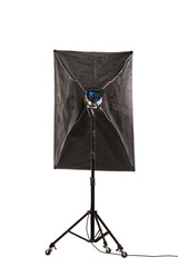 Flash light with softbox on stand with wheels. Studio lighting equipment isolated on white background..