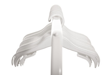 White plastic hangers for clothes hanging on rod from clothing rack. Isolated on white background..