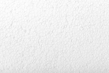 Abstract close up texture photo of compressed white styrofoam background..