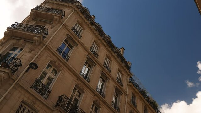 Slow rotation over the luxury French Haussmannian architecture- luxury real estate apartment building in central Paris French city