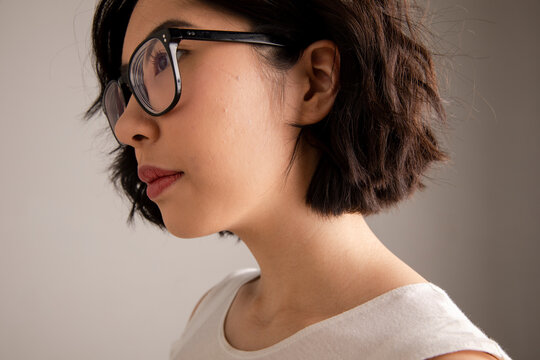 Portrait Of Confident Mixed Race Young Woman With Short Black Hair