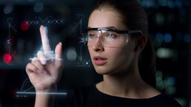 High-tech glasses woman architect inspecting building project hologram thinking
