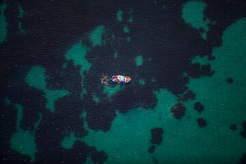 Small Fishing Boat in the Mediterranean off Porticello Santa Flavia Sicily Italy