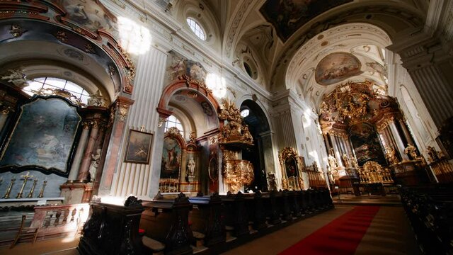 Interior shot of pews inside a beautiful Catholic Church in Austria
