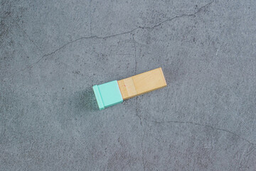 Wood seal with green cap isolated on grey background 