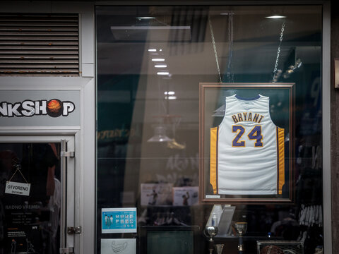 BELGRADE, SERBIA - APRIL 3, 2021: Kobe Bryant Basketball jersey with number 24 on display on a sports shop of Belgrade. Kobe Bryant is an LA Lakers basket ball player who died in 2020. ..