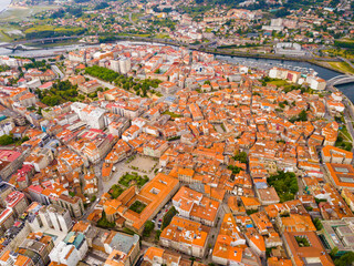 Fototapeta na wymiar Panoramic view from drone on the city center Pontevedra with embankment of the river Rio Lerez. Galicia. Spain