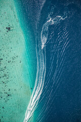 Trail of Jet Boats in Turquoise Waters off Moorea Island French Polynesia