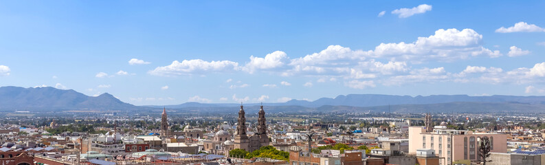 Central Mexico, Aguascalientes. Panoramic view of colorful streets and colonial houses in historic city center near Cathedral Basilica, one of the main city tourist attractions.