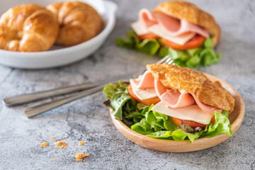 Fresh sandwich stuff ham and cheese on croissant bun for breakfast
