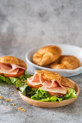 Fresh sandwich stuff ham and cheese on croissant bun for breakfast