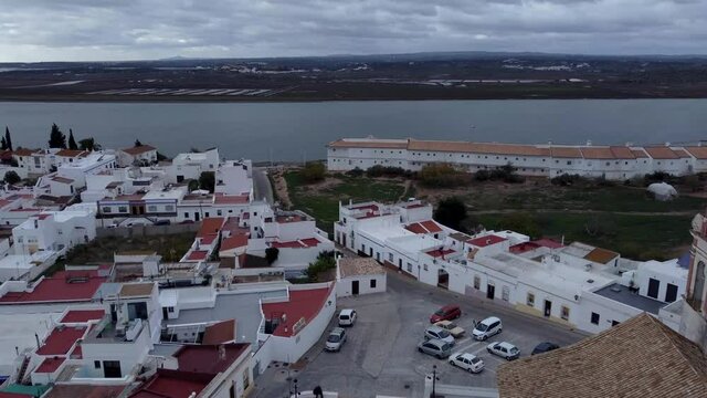 Aerial view of Ayamonte from the Parroquia del Salvador, Spain. Amazing blue sky with streaked clouds. View over the Guadiana River and Vila Real Santo Antonio, Portugal from other side of the bank
