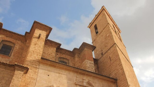 Exterior Facade Of The Segorbe Cathedral In Segorbe, Castellon Province, Spain. low angle, panning right 4k