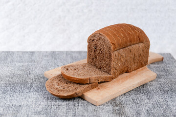 Choco bread loaf slice on a white background. Chocolate flavor	
