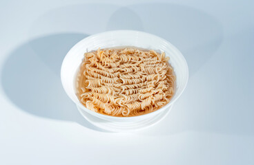 isolated on white background,instant noodles in hot water