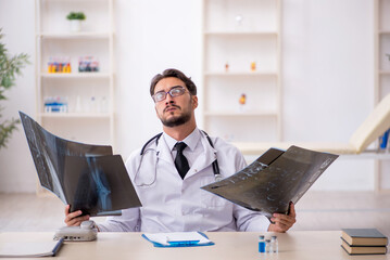 Young male doctor radiologist working in the clinic