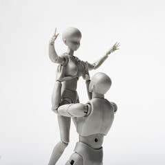 Male and female figures are dancing.