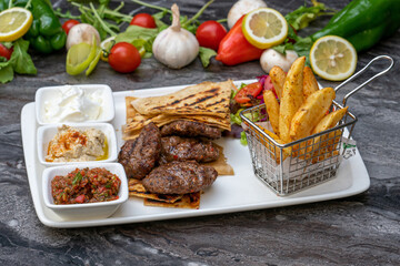 Turkish traditional kofte. Spicy meatballs Kebab or Kebap.