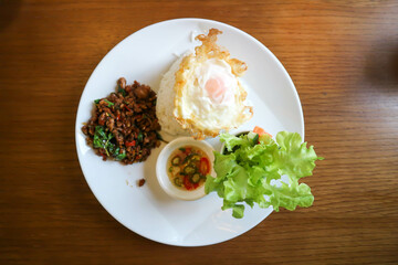 stir-fried pork, stir-fried pork with holy basil and chili .