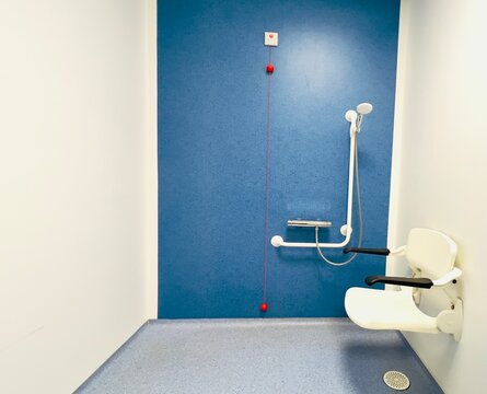 Disability a specially adapted shower for people in a wheelchair with disabilities with an emergency pull chord