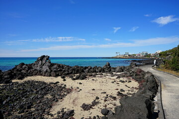 a beautiful seaside walkway and clear bluish sea