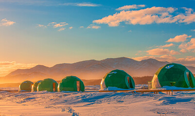 winter glamping at sunset. Kamchatka Peninsula. Selective focus