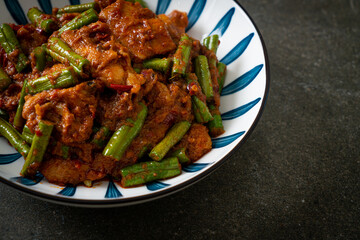 Stir fried pork with red curry paste