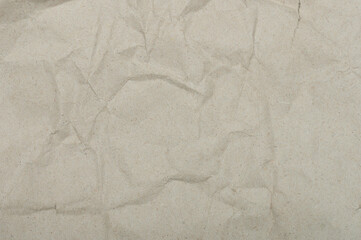 Old crumpled beige color paper background