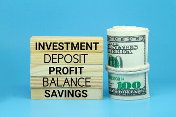 wooden boards with the word investment. investment concept