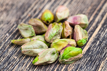 fried salted pistachio nuts , close up