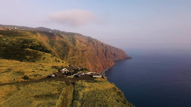 Restaurant Building Near The Cliff In Miradouro Do Fio In Ponta Do Pargo, Portugal. aerial