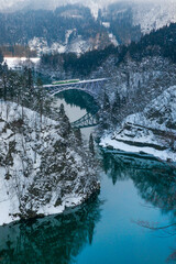 Tadami railway line and Tadami River in winter season at Fukushima prefecture.