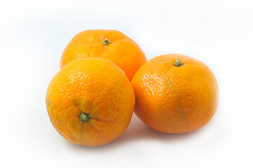 orange tangerines on a white background