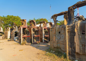 Fototapeta premium Industry factory of broken old cars crash from accidents. Transportation used vehicles.