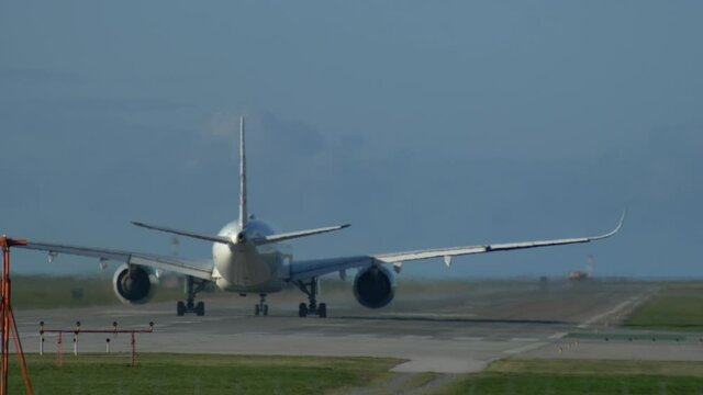 Airplane Taking Off, Sunny Day. Static, Behind.